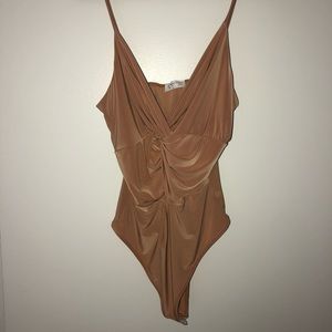 Tan Mocking Jay Bodysuit